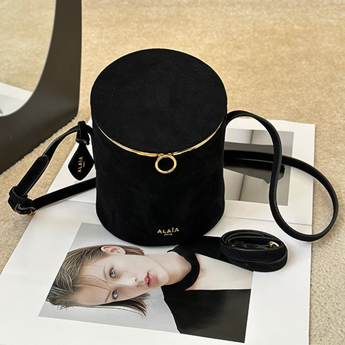alaïa cylindrical bucket crossbody handbag